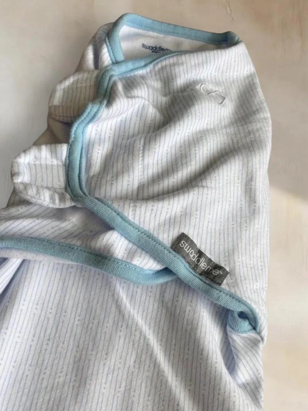 SwaddleMe Baby Sleep Sack Swaddle in White with Light Blue Trim
